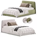 Double Bed With Green And Beige Upholstered Headboard White Quilt Grey Blanket And Pillows