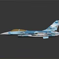 Blue and white fighter jet model with weapons and brown cockpit on dark background
