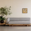 Light Gray Sofa Set with Wooden Coffee Table Black Planter Greenery and Wall Art