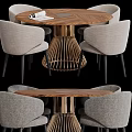 Modern Round Wooden Dining Table With Four Gray Upholstered Chairs And Metal Base