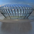 Contemporary Circular Glass Building With Geometric Design By Waterfront At Sunset