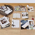 Scattered Open Books And Magazines With Interior Design Food Home Images On Wooden Floor