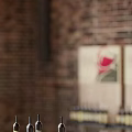 Industrial Style Restaurant Interior With Brick Walls Pendant Lights And Comfortable Seating