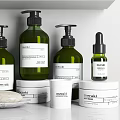 Modern Bathroom Accessories On Shelf With Green Bottles White Containers Toothbrush And Aromatherapy
