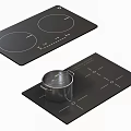 Black Induction Cooktop with Circular Heating Zones and Pot on Modern Kitchen Appliance
