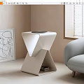 Modern White Geometric Coffee Table In Minimalist Living Room With Sofa And Artwork
