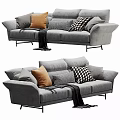 Gray Velvet Three Seater Sofa With Orange Checkered Pillows And Black Blanket