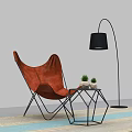 Orange Leisure Chair With Leather Upholstery Black Metal Legs Hexagon Table Plants And Floor Lamp