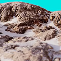 Natural Garden Landscape With Rocky Terrain Sandy Patches And Blue Sky