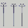 Three Outdoor Street Lamps With Ornate Multi Head Design And Elegant Poles