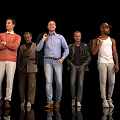 Five Men Standing Together Against Black Background With Different Outfits