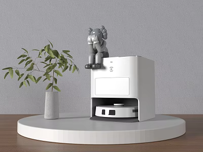 White Smart Machine With Small Toy Figure And Green Plant On Round White Platform 3d model