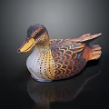 Decorative Duck Figurine With Colorful Feather Details And Yellow Beak On Black Background With Reflection