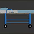Patient Transport Trolley With Blue Frame Brown And Blue Mattress And Rolling Wheels