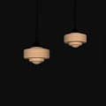 Two Classic Chandeliers With White Glass Shades And Silver Metal Chains Hanging On Dark Wall