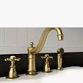 Double Bowl White Sink with Gold Faucet and Black Countertop