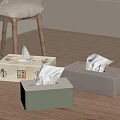 Different Colored Tissue Boxes On Wooden Table In Minimalist Home Interior