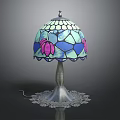 Stained Glass Table Lamp With Pink And Blue Floral Patterns Silver Base And Lace Trim