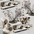 Stylish Decorative Ornament Set With Dried Flowers Glass Vases And Ceramic Pieces On Stacked Books