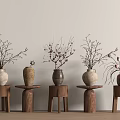Minimalist Interior With Various Colored Ceramic Vases Holding Dried Branches On Wooden Stools