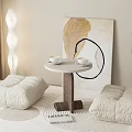Cozy Living Corner With Poufs Round Side Table Tea Cups And Floor Lamp