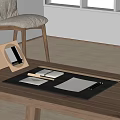 Minimalist Desk Workspace With Folding Frame Notebook And Pens In Bright Interior 3d model