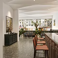 Modern Café Interior Design With Marble Tables Green Plants And Wooden Bar