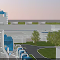 Modern Industrial Factory With Blue Cooling Towers Green Lawns Trees And Pipelines