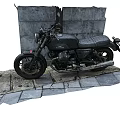 Vintage Black Motorcycle With Headlight Exhaust Pipe Parked On Stone Pavement Near Gray Wall
