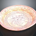 Traditional Pink And Beige Carved Circular Plate With Central Design And Decorative Edges