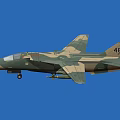 Camouflage Fighter Jet With Tail Number 48 LN Missiles And Landing Gear In Blue Sky