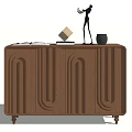 Modern Wooden Sideboard with Grooved Pattern Design and Decorative Figurine and Box on Top