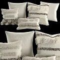 Cream Decorative Throw Pillows Featuring Striped Fringed Beaded Textured Details