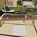 Zen Style Tea Set On Wooden Table With Garden View And Stone Elements