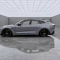 Modern Gray Sports Car With Stylish Black Rims And Sleek Exterior In Showroom Setting