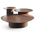 Modern Coffee Tables Featuring Circular Tops And Cylindrical Brown Bases Design