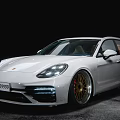 White Luxury Car Featuring Sleek Exterior Design And Gold Alloy Wheels