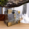 Transparent Glass Cube Decorative Ornament Set With Golden Corner Accents On Wooden Tabletop