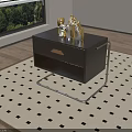 Black Side Table With Drawer Gold Handle Metal Frame And Decorations On Patterned Rug