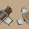 Square And Round Entertainment Tables With Wooden Fabric Chairs And Decorative Plants