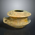 Ancient Clay Vessel With Carved Patterns Lid And Handle Earth Toned Design