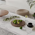 Fresh Limes On Wooden Tray Over Marble Surface With Greenery And Water Glass