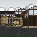 Traditional Boutique Guesthouse Building With Stone Wall Wooden Frame And Outdoor Umbrella Area