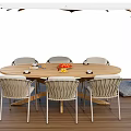 Outdoor Wooden Dining Table Set with Six Chairs Umbrella and Fruits on Wooden Deck
