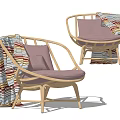 Outdoor Chair With Rattan Frame Round Back Purple Cushion And Colorful Striped Blanket