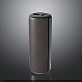 Modern Portable Bluetooth Speaker With Textured Surface And Cylindrical Wireless Design