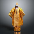 Traditional Golden Robe and Hat with Ornate Patterns and Tassel Accents