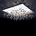 Ceiling Mounted Sparkling Crystal Chandelier With Hanging Pendants And Modern Design