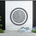 Chinese Style Feature Wall with Circular Relief Carving Black Border Green Plants and Stones