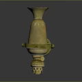 Vintage Golden Metal Equipment With Intricate Top Decorative Stand And Base On Black Surface